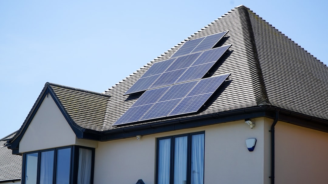 who-we-are Solar panel systems on a house roof